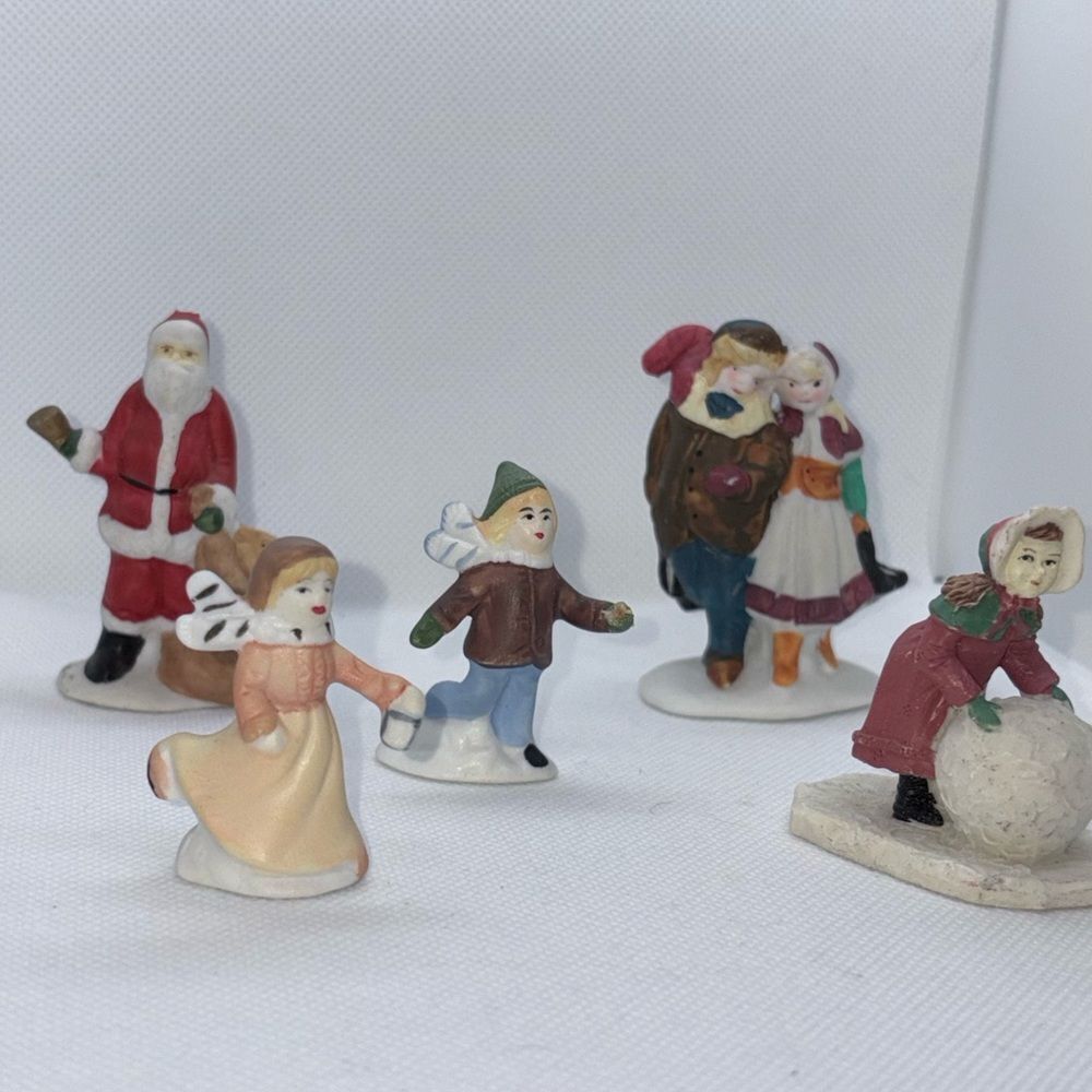 Festive Holiday Village Figurine Set grouping of 5.